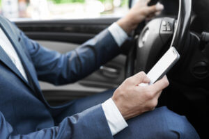Texting at a light is allowed in the state of New Jersey.